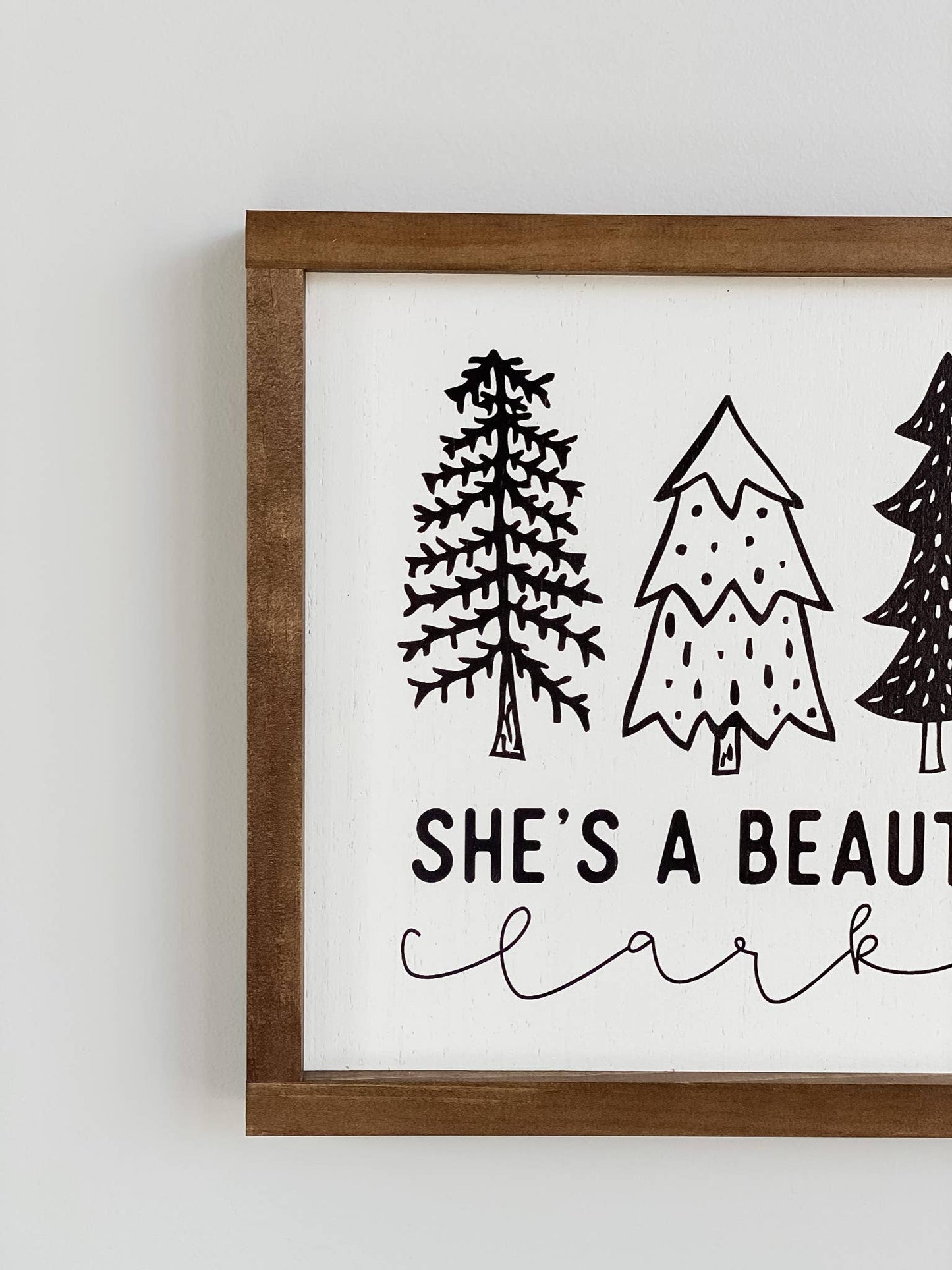She's A Beaut Clark Sign