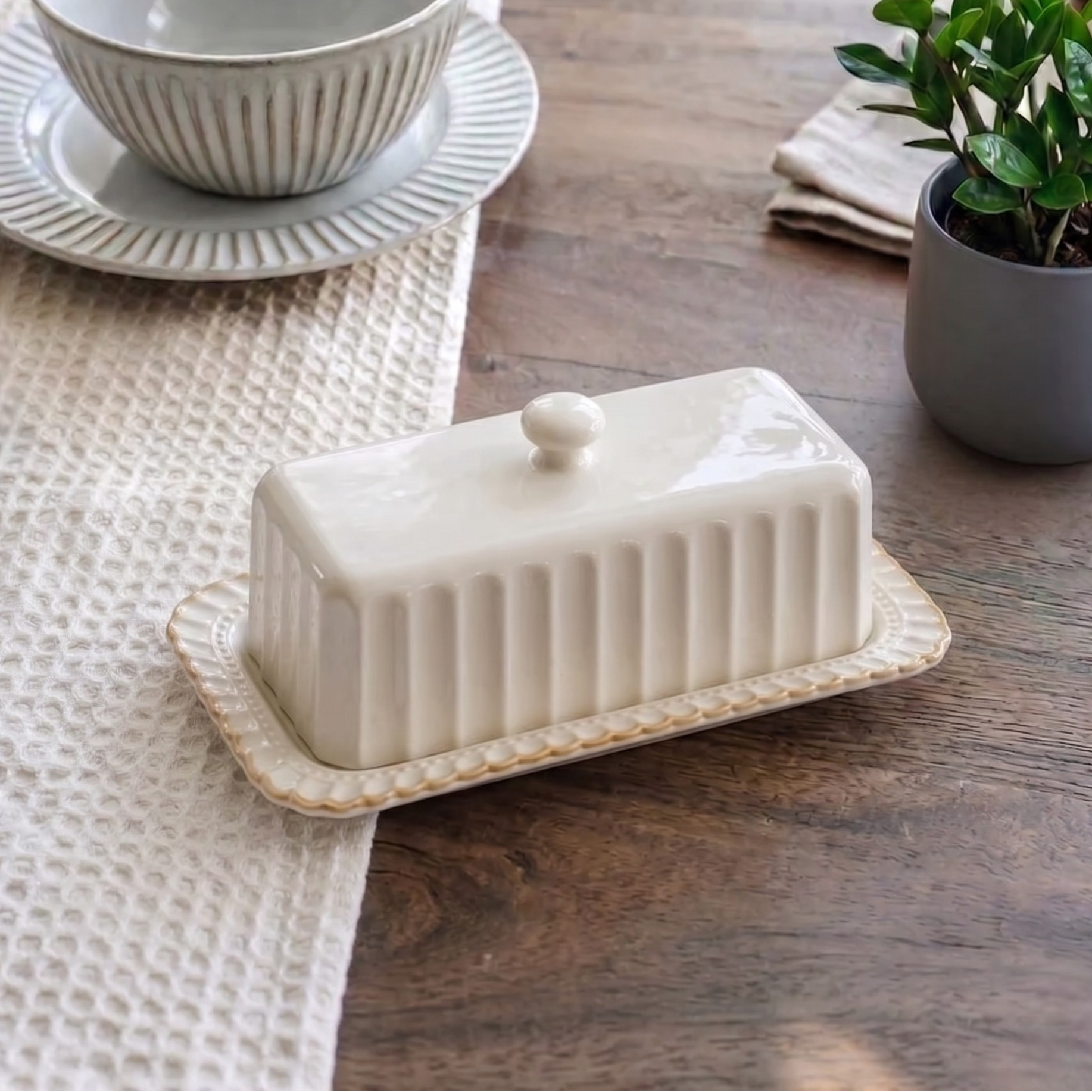 white ceramic butter dish