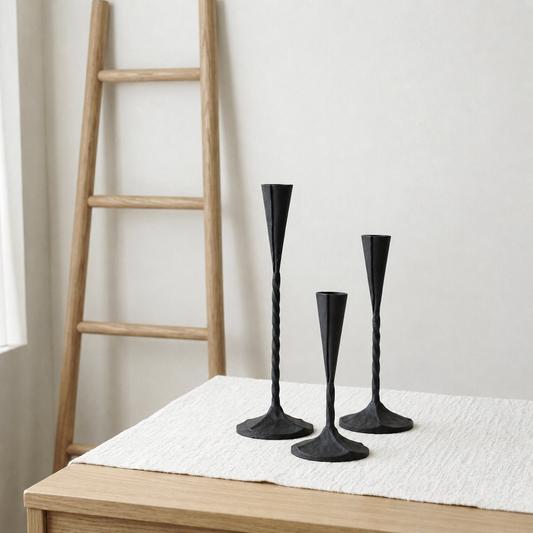 Set of 3 black metal taper candle holders with twisted design 
